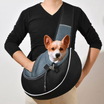 Pet Carrier Bag for Dogs & Cats worn across the body with a dog inside, showcasing portability and comfort.