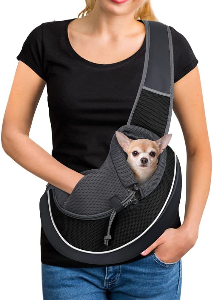 Pet Carrier Bag for Dogs & Cats worn crossbody style with a small dog inside, showcasing portability and comfort.